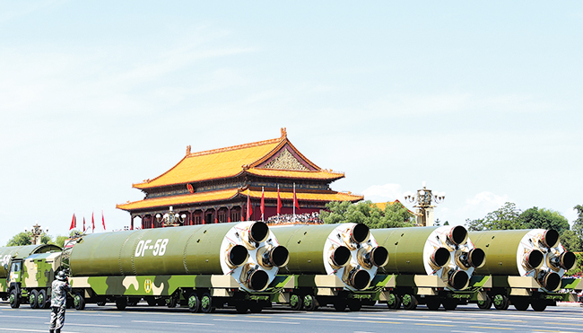 Nuclear missiles are displayed September 3, 2015, during a parade in Beijing. As the US, Chinese, and other militaries seek to leverage artificial intelligence to support applications that include early warning, automatic target recognition, intelligence analysis, and command decision-making, it is critical that they learn from earlier errors, close calls, and tragedies.
